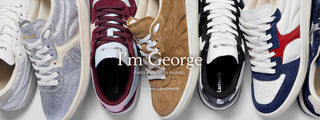 Banner com diferentes modelos de tênis Larroudé lado a lado, em cores e materiais variados como prata metalizado, vinho, camurça caramelo, preto e branco com detalhes em azul e vermelho. Sobreposição de texto: “I’m George. Feito para todo mundo.” e chamada “Conheça o lançamento”.
